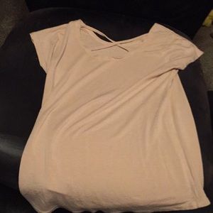 Pink shirt cross over on the back